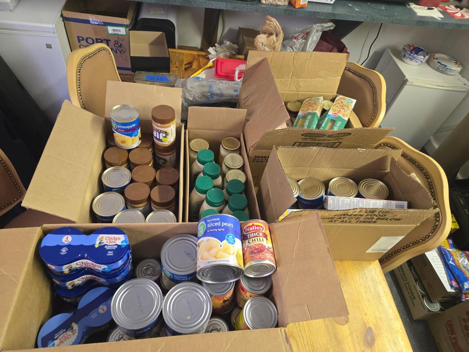 Boxes of donated food from the Missoula GOP food drive